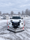 Čelný pohľad na Mitsubishi L200 STONE TRADE so snehovou radlicou Hilltip